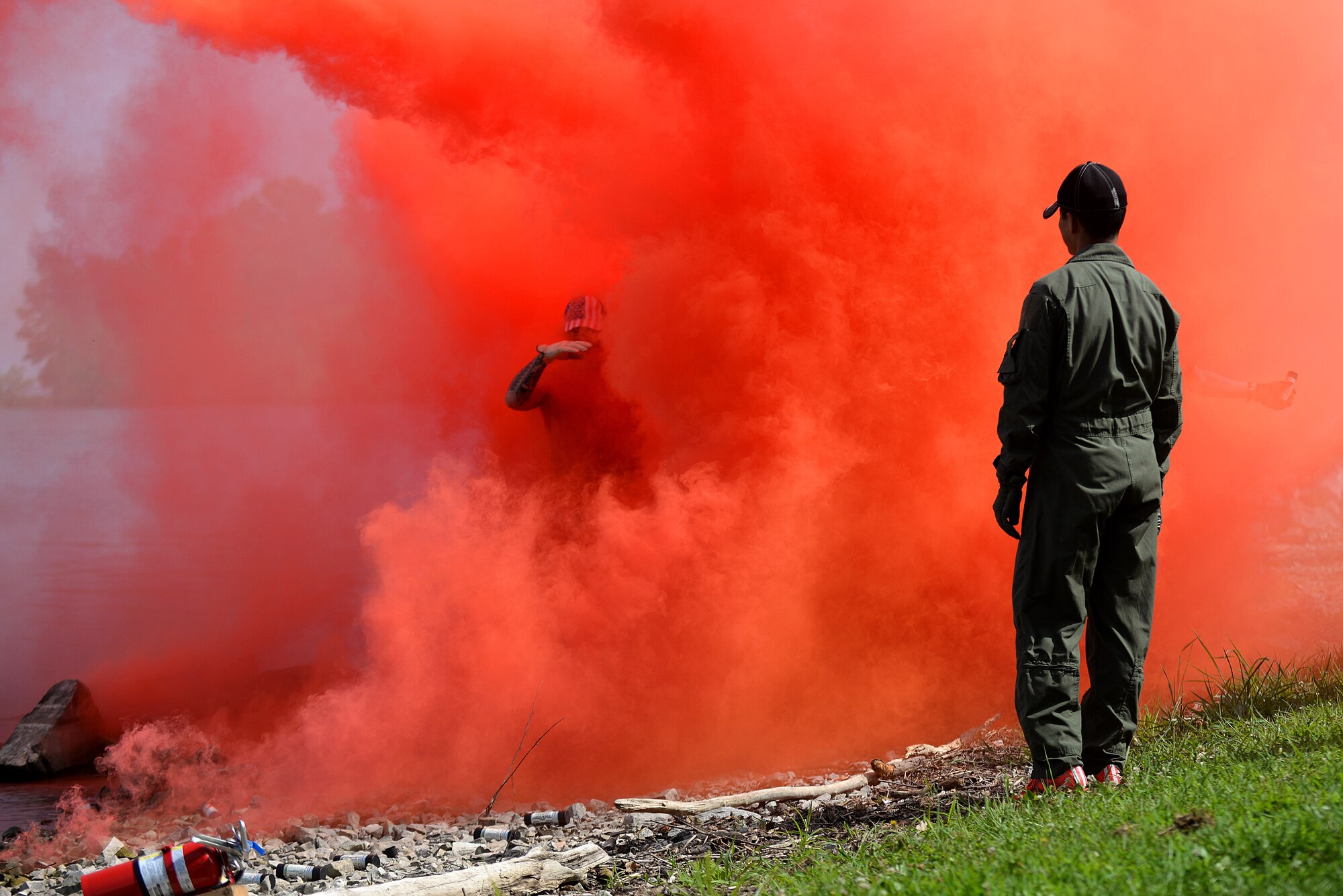 Participants of the water survival training portion of the Survival, Evasion, Resistance, and Escape, or SERE, training exercised their ability to use specific life-saving devices, such as flares and life-jackets, July 16, 2015, at Carlyle Lake, Carlyle, Ill. Scott Air Force Base has a team of specialists that teach pilots and aircrew SERE techniques each month. The training is split up into two portions: combat survival training and water survival training. (U.S. Air Force photo/Senior Airman Jake Eckhardt)