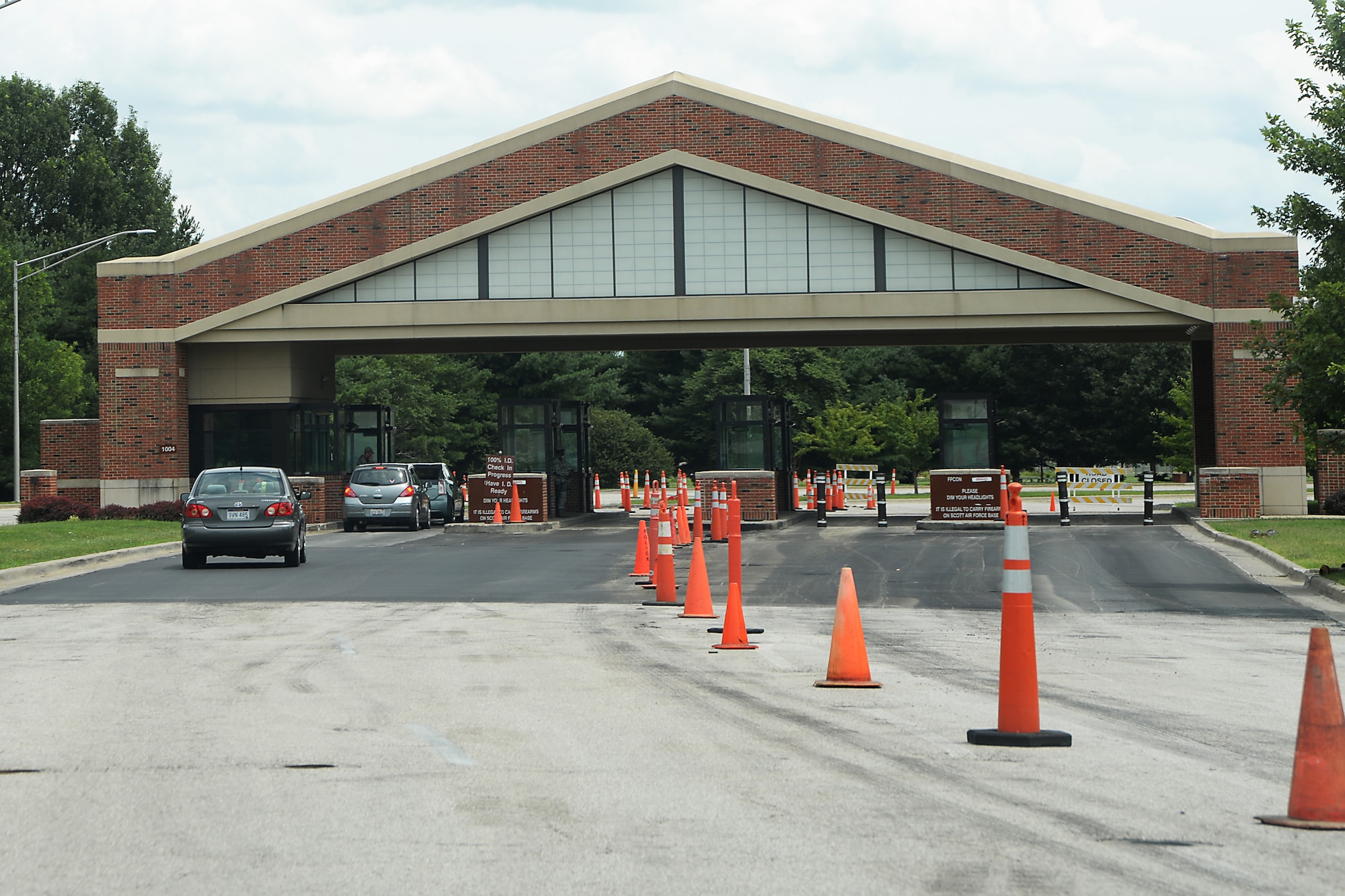 Members and guests enter the base through the Shiloh Gate, July 21, 2015, at Scott Air Force Base, Ill. Around 4,000 individuals were sponsored onto base in the month of June, however it is also one of the most busy times of the year. (U.S. Air Force photo by Airman 1st Class Melissa Estevez)