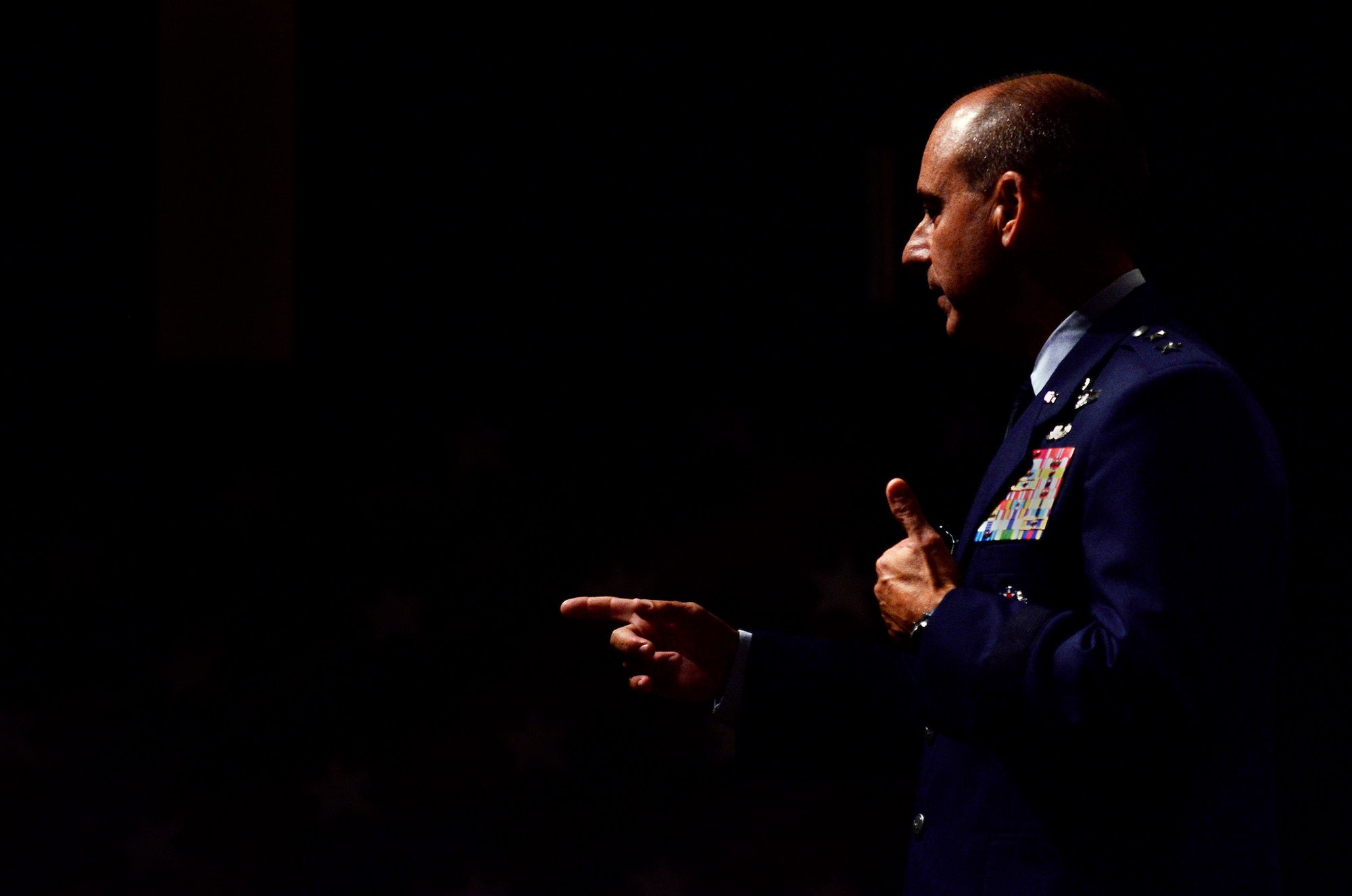 Maj. Gen. Jeffrey Harrigian, the Air Force F-35 Integration Office director, speaks during the Joint Specialized Undergraduate Pilot Training Class 15-12 graduation at Vance Air Force Base, Oklahoma, July 24. “As you go forward, and particularly when you deploy to different places, you keep some perspective on this. And I ask you to do that – take care of yourself, because we need you guys,” Harrigian said. “When you get to your next training, ask all of the hard questions. Pick the brains of those captains and majors that you’re flying with. Become as smart as you can on your weapons system. Be an expert.” (U.S. Air Force photo/2nd Lt. Mikhail Berlin)