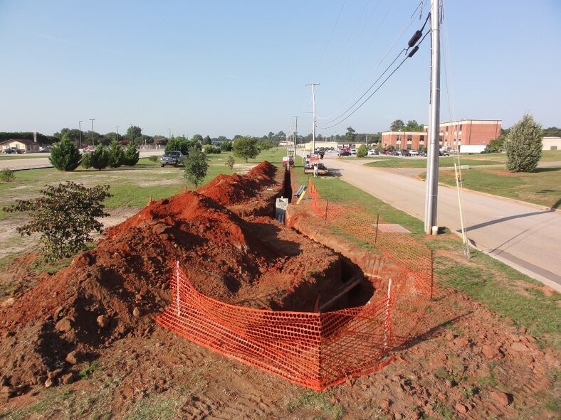 Contractors install a new underground electrical distribution system at Shaw Air Force Base, S.C., July 2015.  (U.S. Air Force/Courtesy photo)