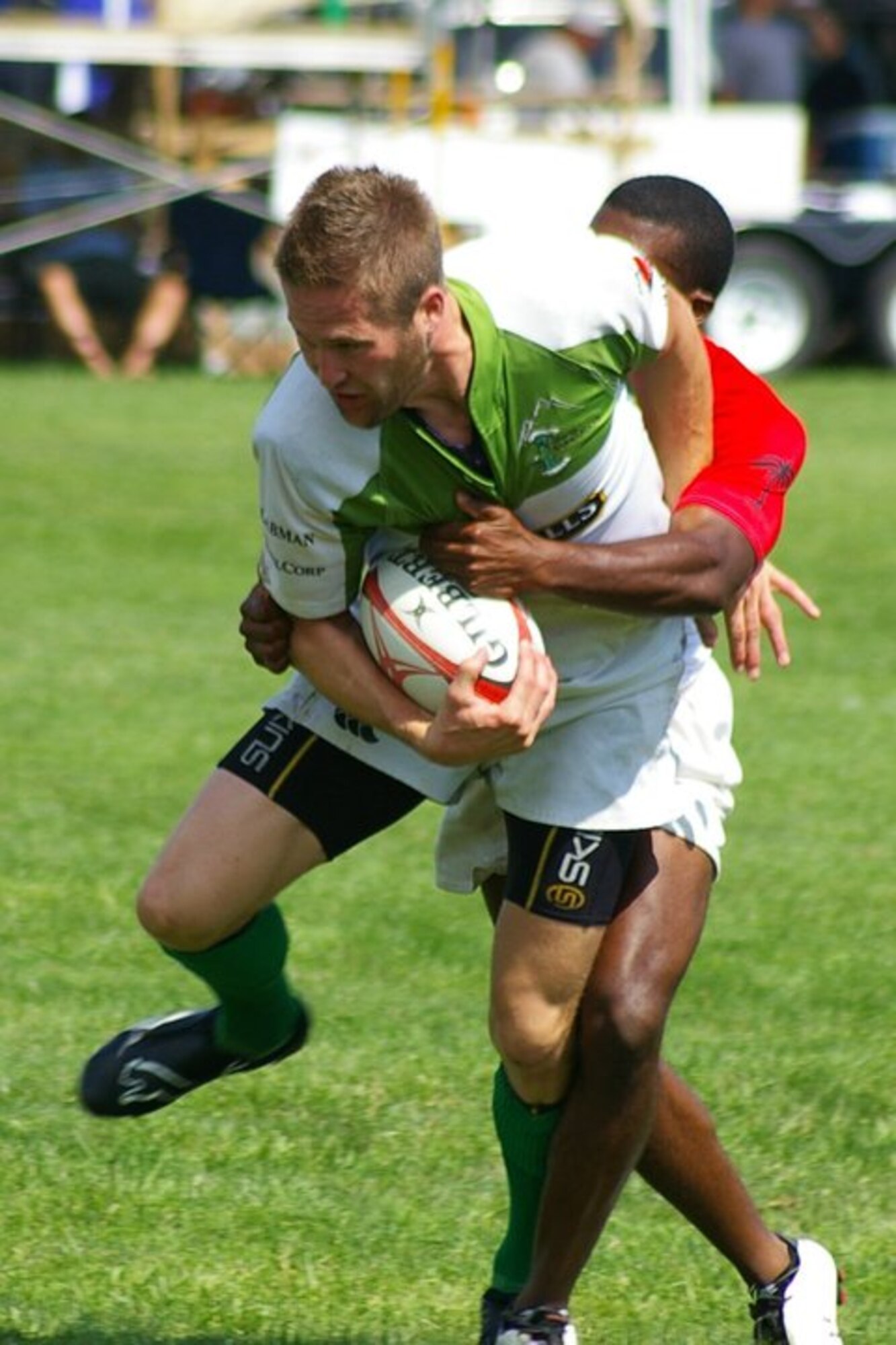 Senior Airman Benjamin A. Haapapuro (pictured holding the ball), a space systems maintainer with the 233rd Space Group, Colorado Air National Guard, is the captain of this year's official Air Force Rugby Team. The team will compete against teams from the other branches of the military to win the Armed Forces Championship during the annual Serevi Rugby 7’s tournament August 14-16 at Infinity Park, Glendale, Colo. (Photo courtesy of Senior Airman Theodore J. Szarzynski)