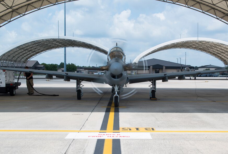 U.S. Air Force Maj. Gen. H. D. Polumbo Jr., Ninth Air Force commander, prepares to takeoff in an A-29 Super Tucano July 23, 2015, at Moody Air Force Base, Ga. Polumbo learned the A-29’s mission of providing offensive and defensive aerial fires capability along with reconnaissance and surveillance capability within Afghanistan.  (U.S. Air Force photo by Airman 1st Class Kathleen D. Bryant/Released).


