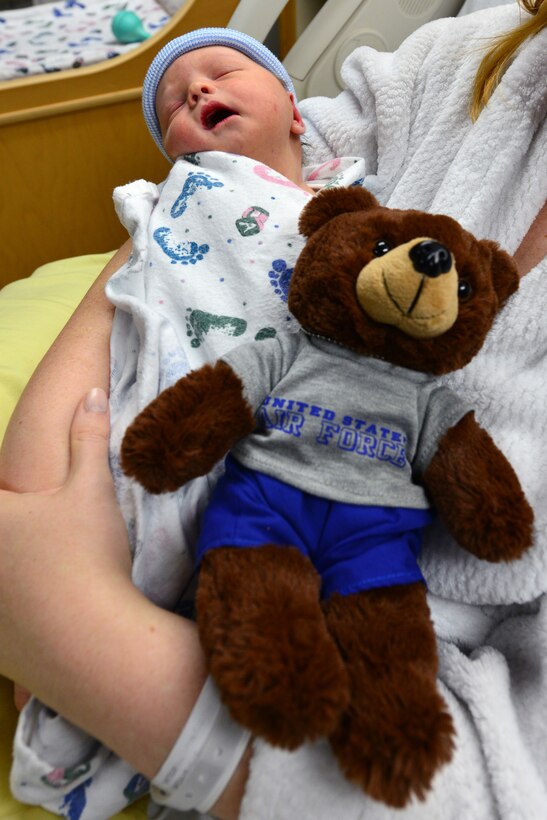 Alexander, U.S. Air Force dependent, sleeps in his mother’s arms at Langley Air Force Base, Va., July 17, 2015. Alexander’s mother, Katie, gave birth to him in the parking lot outside of USAF Hospital Langley with the help of her husband and two U.S. Air Force Airmen. (The last names of individuals in this photo were omitted for security purposes) (U.S. Air Force photo by Senior Airman Aubrey White/Released)