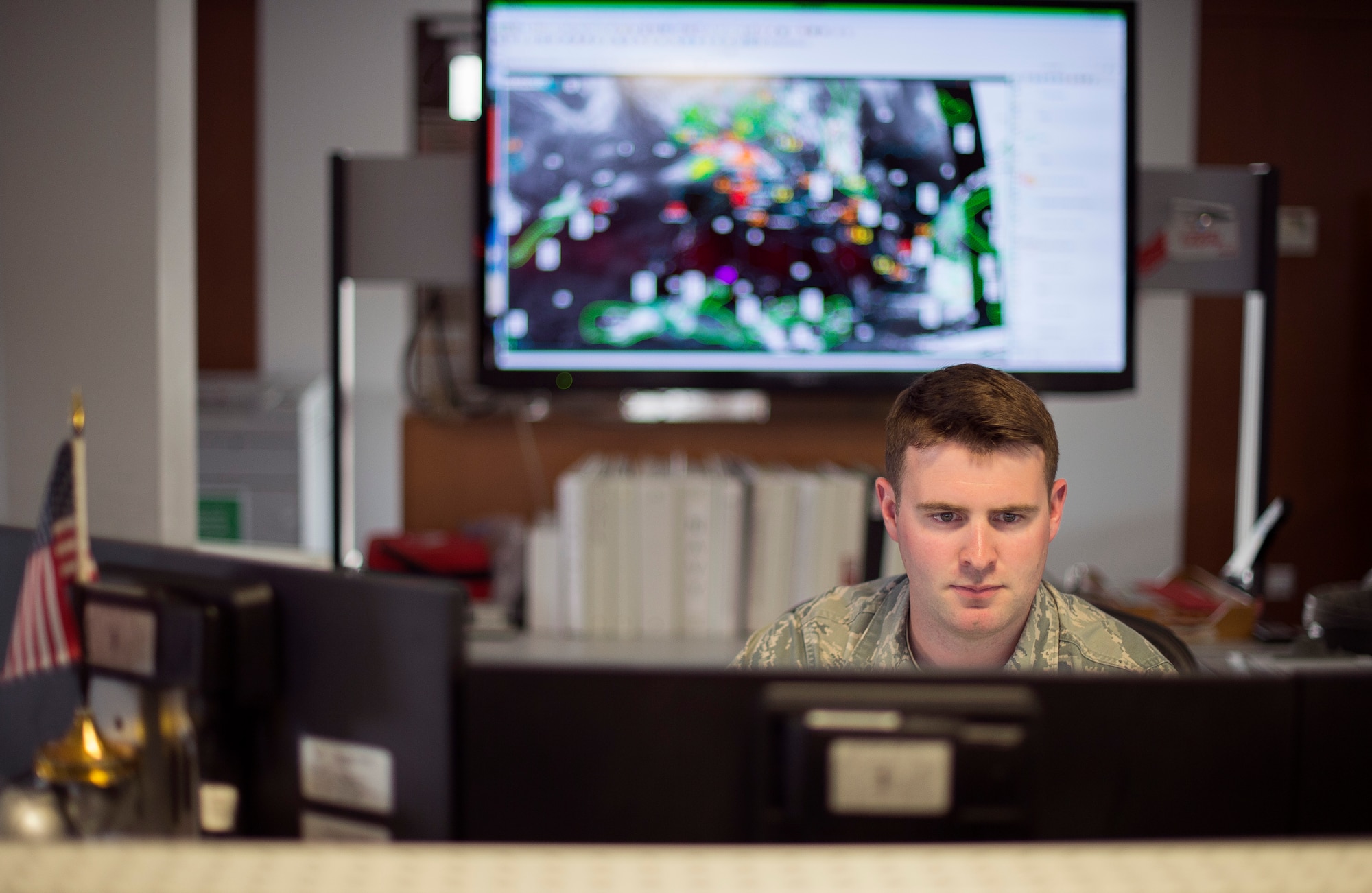 U.S. Air Force Staff Sgt. Trevor Reiss, 21st Operational Weather Squadron weather journeyman, works on a weather forecast July 28 at Kapaun Air Base, Germany. Reiss was selected as the 2014 Air Force Weather Airman of the Year. (U.S. Air Force photo by Senior Airman Damon Kasberg)