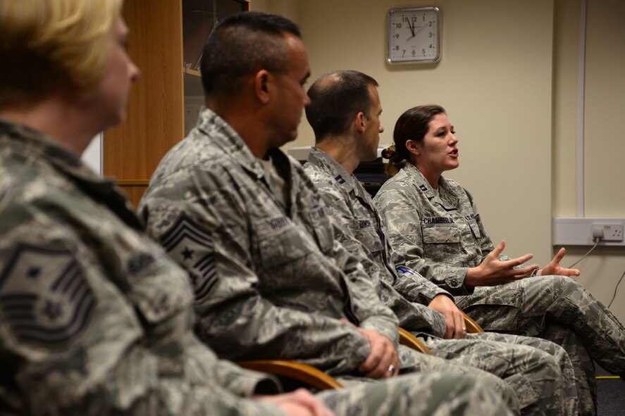 U.S. Air Force Capt. Allison Chamberlin, right, 95th Reconnaissance Squadron intel flight commander and 100th Air Refueling Wing alternate sexual assault response coordinator from Standish, Maine, speaks as a panel member during a Sexual Assault Prevention and Response lunch-and-learn July 28, 2015, on RAF Mildenhall, England. The lunch-and-learn provided Airmen across base the chance to come together and talk about sexual assault with a panel of base leadership. The SAPR office provides lunch-and-learns on a monthly basis. The panel consisted of a first sergeant, the command chief, air defense council and a victim advocate. (U.S. Air Force photo by Senior Airman Christine Halan/Released)