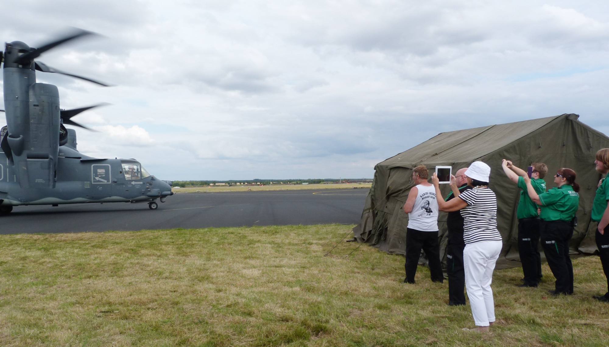 A CV-22B Osprey from the 7th Special Operations Squadron taxies to the runway to takeoff for an aerial demonstration which showcased its capabilities July 23, 2015, during the RAF Marham Family Day, in Norfolk, England. The event commemorated the 75th Anniversary of the Battle of Britain. (U.S. Air Force photo by Karen Abeyasekere)