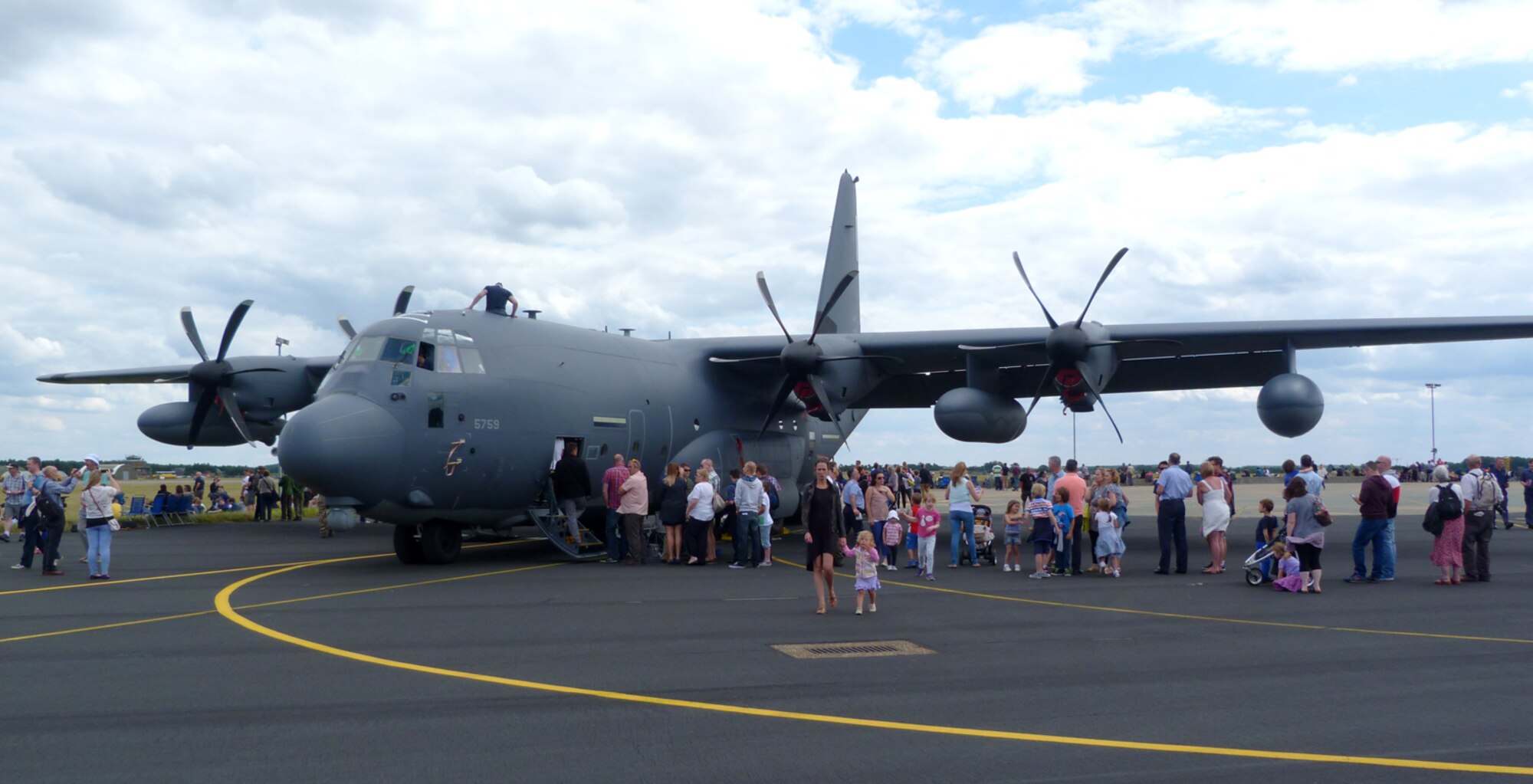 A static display of the MC-130J Commando II from the 67th Special Operations Squadron allowed UK forces and their families to view the aircraft and ask the aircrews about its capabilities July 23, 2015, during the RAF Marham Family Day, in Norfolk, England. The event commemorated the 75th Anniversary of the Battle of Britain. (U.S. Air Force photo by Karen Abeyasekere)