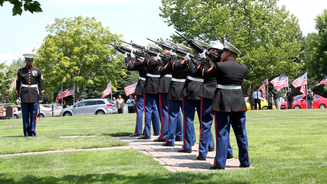 A Marine Corps rifle team fires the three-volley salute for Gunnery Sgt. Thomas J. Sullivan’s funeral July 27, 2015, at Veterans Memorial Cemetery in Agawan, Massachusetts. Sullivan was one of five victims of the Chattanooga, Tennessee shootings July 16, 2015. Sullivan was described by his family and fellow Marines as a Marines Marine, and always had a quirky smile that resembled a kid in a candy store.