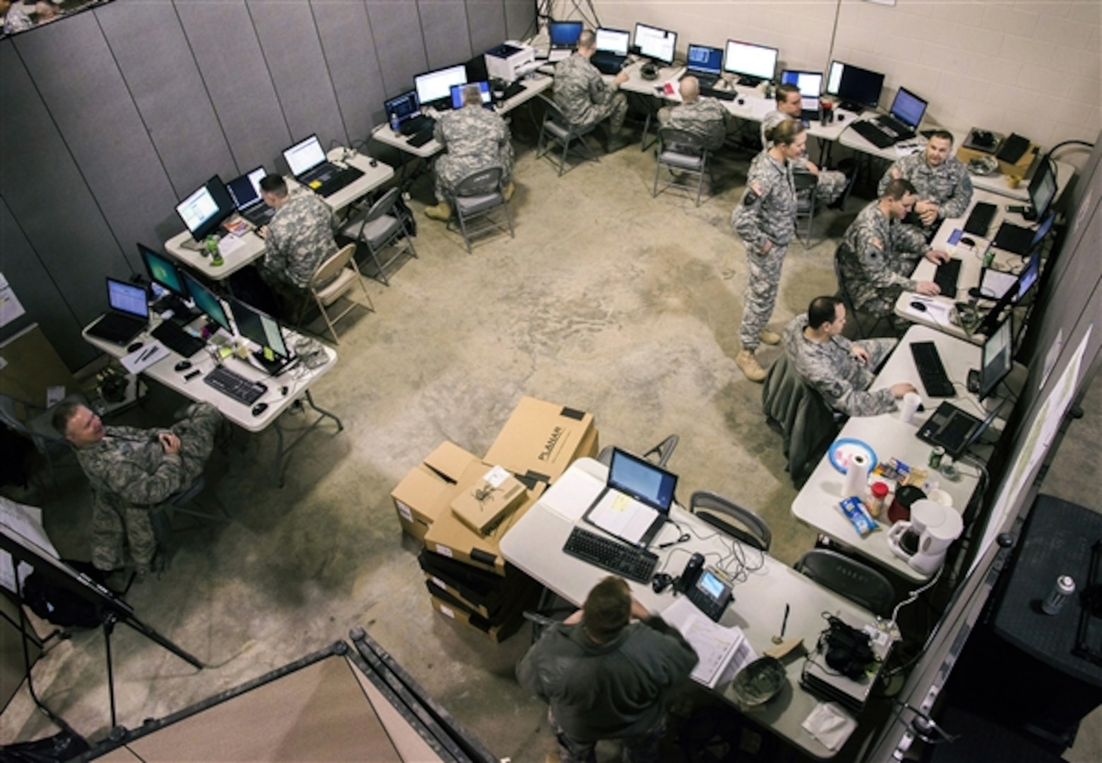 Members of the Ohio National Guard Computer Network Defense Team conduct cyber defense operations during exercise Cyber Shield 2015 at Camp Atterbury, Indiana, March 20, 2015. The exercise was designed to develop the defensive skills of soldiers and airmen tasked with securing their organizations’ computer networks. 