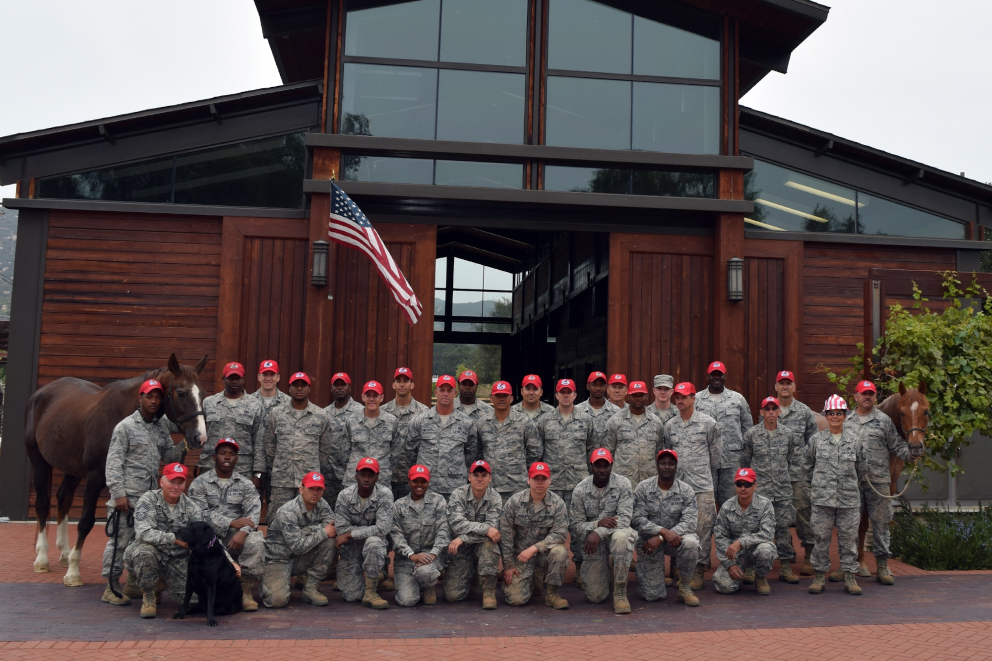 U.S. Air Force RED HORSE members pose for a group photo at the “Campus of Life,” in San Marcos, Calif., June 11, 2015. The Airmen have been working on the Training, Education, Research and Innovation (TERI) project as part of an Innovative Readiness Training project to benefit children with special needs. (Courtesy photo)