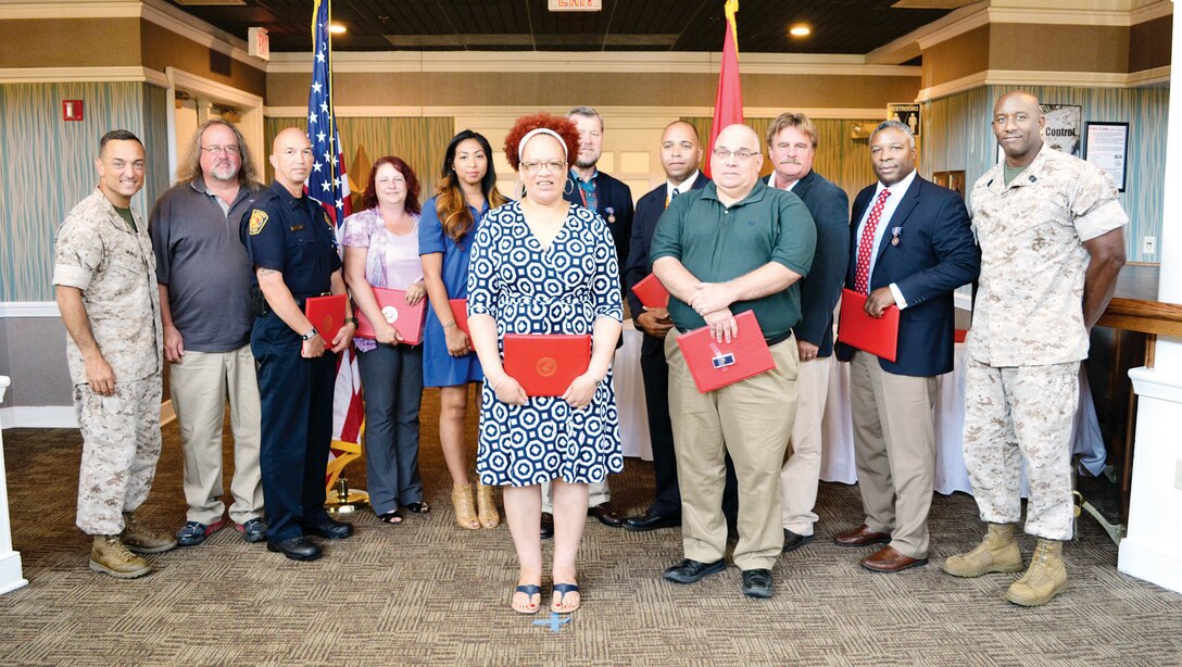 On July 23, Col. Josephy Murray, commanding officer of Marine Corps Base Quantico, presented awards to civilian employees of the base who have reached length of service milestones, earned employee of the quarter and provided extraordinary assistance during the DoD Warrior Games.