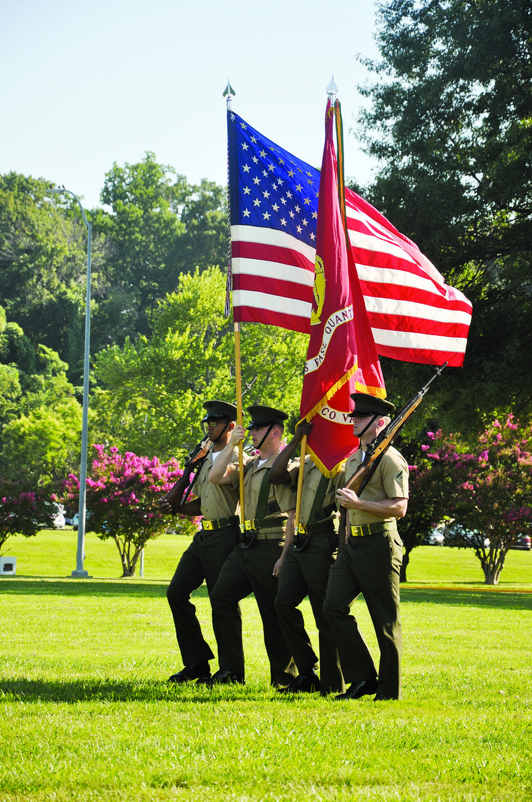 A U.S. Marines colorguard presents the colors during the invocation during the relief and appointment ceremony for Headquarters and Service Battalion July 24, here.