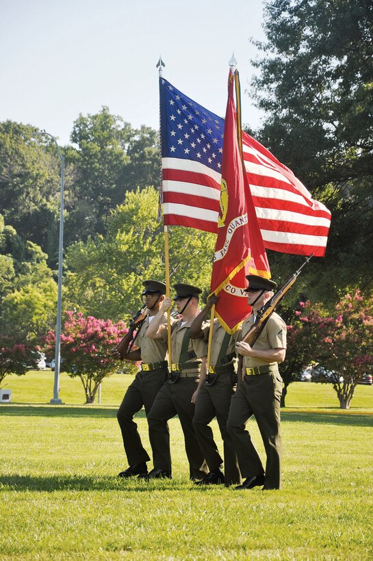 A U.S. Marines colorguard presents the colors during the invocation during the relief and appointment ceremony for Headquarters and Service Battalion July 24, here.