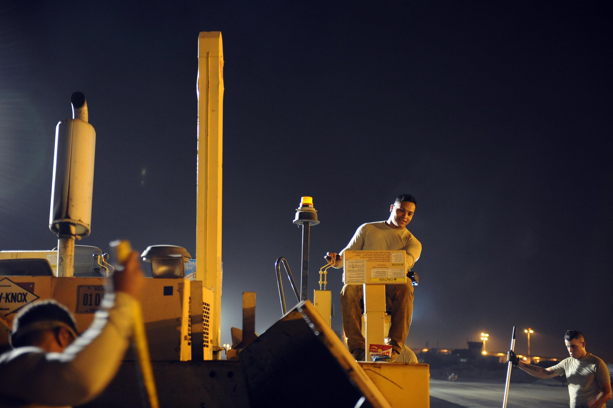 U.S. Air Force Airmen of the 820th RED HORSE pave an aircraft runway July 29, 2015 at an undisclosed location in Southwest Asia. The aircraft flying in and out of the airfield conduct precision airstrikes in Iraq and Syria as part of the U.S. and coalition’s strategy to degrade and defeat the Islamic State, or ISIL. (U.S. Air Force photo by Tech. Sgt. Brittany E. Jones)