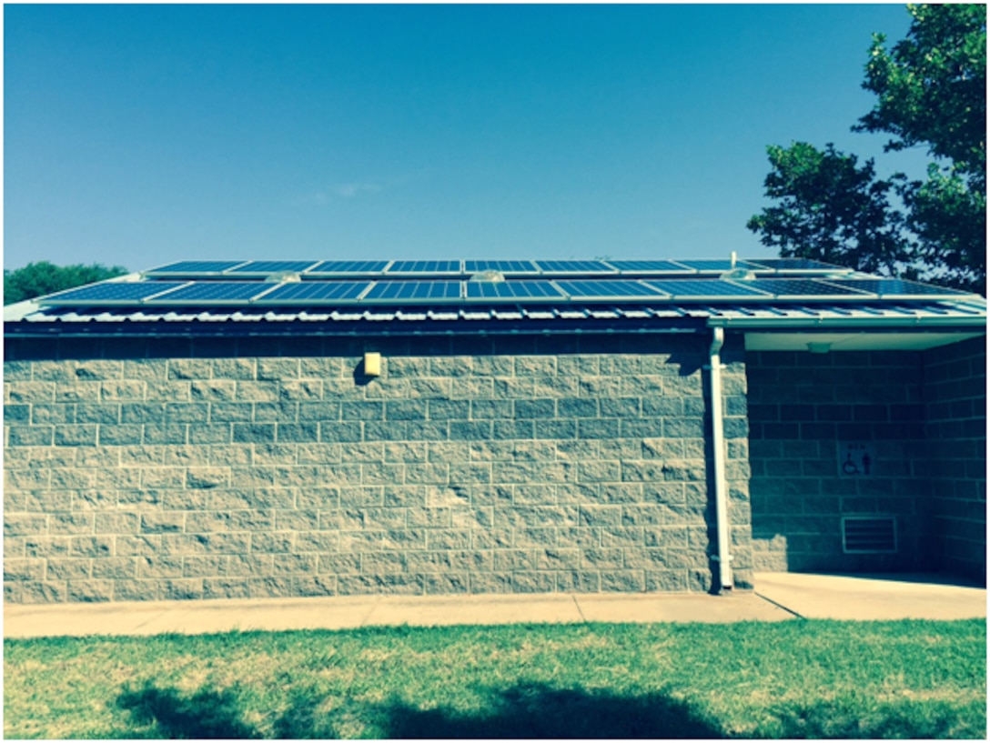 The shower and restroom facility at Supply Park on Fort Supply Lake received a green energy upgrade, July 21. The solar panels will offset energy costs at the park.
