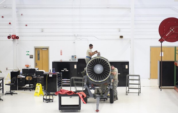 Members of the 23rd Component Maintenance Squadron Propulsion Flight perform maintenance on a TF-34 engine July 27, 2015, at Moody Air Force Base, Ga. The 23rd CMS supplies the 74th and 75th Fighter Squadrons with TF-34s in support of Moody AFB’s A-10C Thunderbolt IIs. (U.S. Air Force photo/Airman Greg Nash)