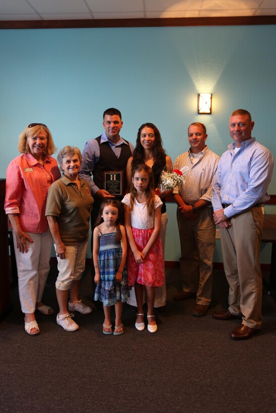 Gunnery Sgt. Lizabeth B. Fogleman and her family are recognized as the Havelock Military Family of the Quarter for their outstanding volunteer efforts in the surrounding Havelock, North Carolina community, July 28, 2015. Fogleman actively volunteers at her church, a local elementary school, and coaches youth sports while balancing her life in the Marine Corps. Fogleman is an individual material readiness list asset manager and uniform victim advocate for Marine Wing Headquarters Squadron 2 stationed at Marine Corps Air Station Cherry Point, N.C. 