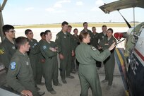 Major Erin Shay, (right) and Capt. Kelly Wolter, 559th Flying Training Squadron flight instructors, brief Air Force Academy cadets on the T-6 Texan ll aircraft July 28, 2015 at Joint Base San Antonio-Randolph.  The cadets are being exposed to different career fields, which can be chosen upon graduation. The 559th FTS provides training for instructor pilots utilizing the T-6 Texan ll aircraft, which is used to teach pilots basic flying skills.  (U.S Air Force photo by Joel Martinez/Released)