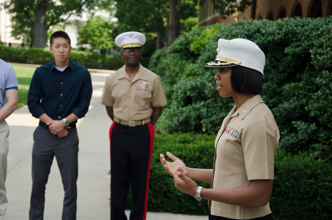 U.S. Marine Corps Lieutenant Gen. Ronald L. Bailey, the Deputy Commandant for Plans, Policies and Operations for the Marine Corps, tells a story about Maj. Lisa Lawrence’s character and experience during her promotion ceremony at Marine Barracks Washington, D.C., June 6, 2015. Lawrence, a native of Houston, has served in the Marine Corps for 11 years as a public affairs officer, completing combat tours in both Iraq and Afghanistan. She currently serves as an officer selection officer for Recruiting Station Baltimore, where she is tasked with recruiting highly qualified men and women who desire to become Marine officers. (U.S. Marine Corps photo by Sgt. Bryan Nygaard/Released)