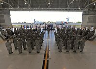 Members of the 15th Wing attend the 15th Maintenance Group change of command ceremony on Joint Base Pearl Harbor-Hickam, Hawaii, July 28, 2015. Col. Randy Huiss, 15th Wing commander, presided over the ceremony as Col. Robert Copes assumed command of the 15th MXG from Col. David Pastore. (U.S. Air Force Photo by Tech Sgt. Aaron Oelrich/Released)
