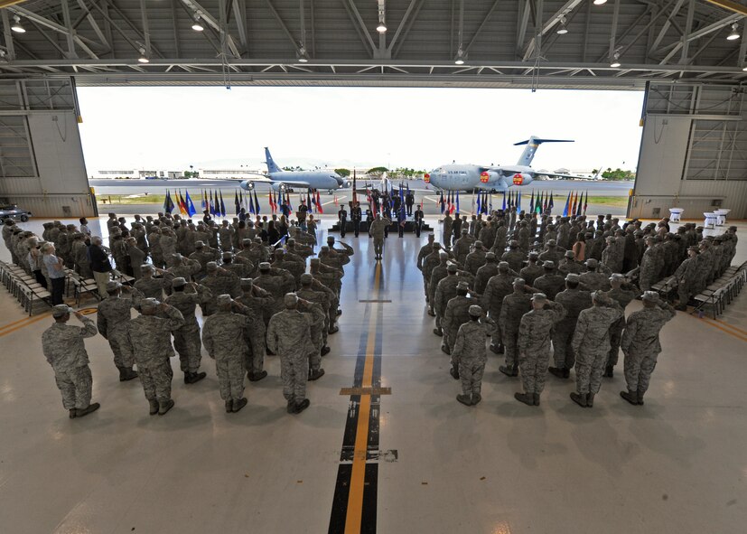 Members of the 15th Wing attend the 15th Maintenance Group change of command ceremony on Joint Base Pearl Harbor-Hickam, Hawaii, July 28, 2015. Col. Randy Huiss, 15th Wing commander, presided over the ceremony as Col. Robert Copes assumed command of the 15th MXG from Col. David Pastore. (U.S. Air Force Photo by Tech Sgt. Aaron Oelrich/Released)
