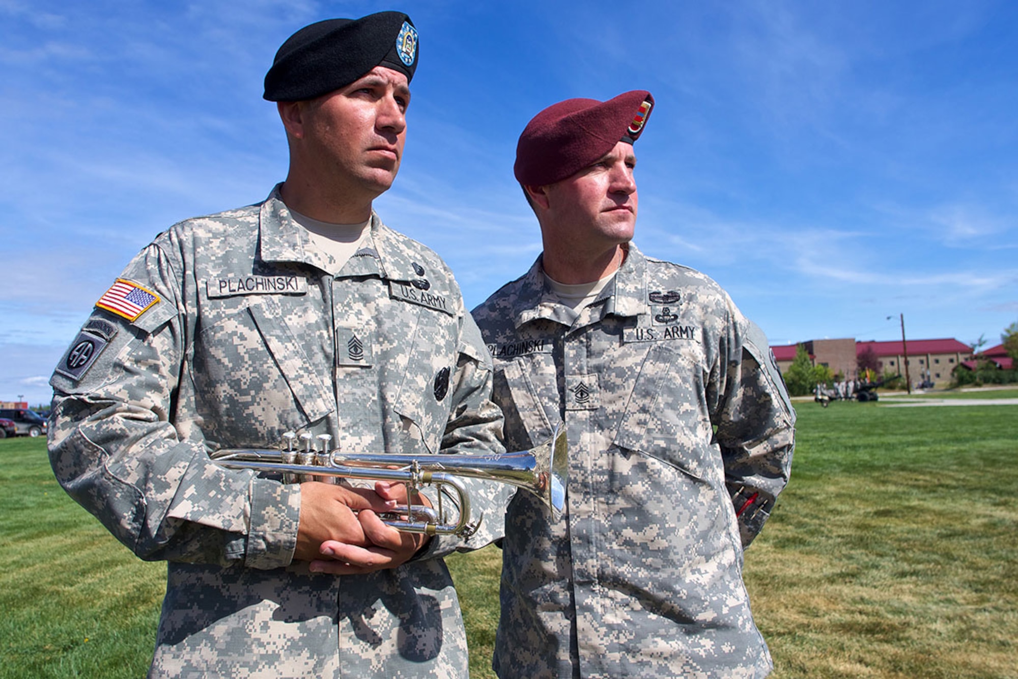Brothers and first sergeants Michael and William Plachinski stand together July 10 at the Pershing Parade Field. Michael is the 9th Army Band first sergeant at Fort Wainwright. William is the Easy Company, 725th Brigade Support Battalion first sergeant at Joint Base Elmendorf-Richardson. (U.S. Air Force photo/David Bedard)     
