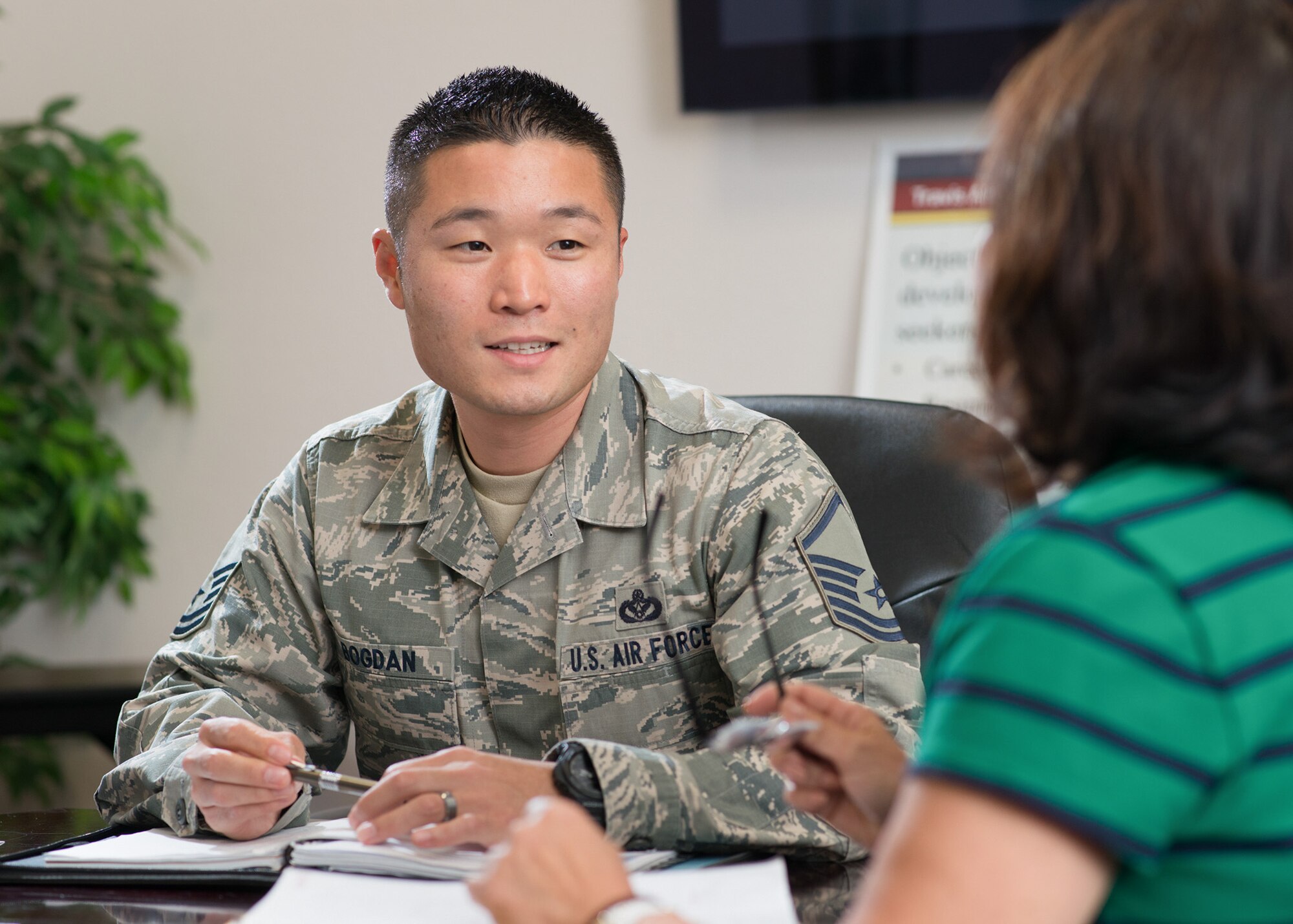 Master Sgt. Joseph Bogdan wears many hats as the 60th Force Support Squadron's Airman and Family Readiness Center superintendent at Travis Air Force Base, Calif. From teaching classes that help Airmen and civilians improve their working relationships to providing customer service to family members in time of crisis, Bogdan epitomizes the Air Force core values. (U.S. Air Force photo by Ken Wright)