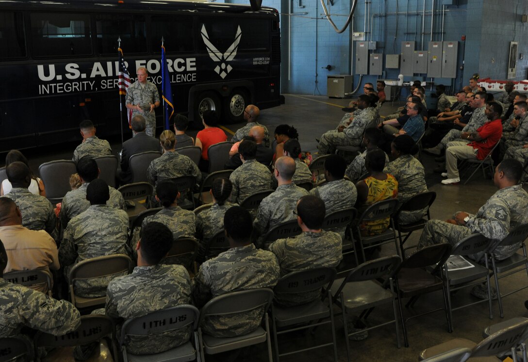 Chief Master Sgt. of the Air Force James Cody speaks during an 11th Logistics Readiness Squadron all-call, July 29, 2015, on Joint Base Andrews. Cody spoke about current events in the Air Force and answered questions from members of the 11th LRS. (U.S. Air Force photo/Airman 1st Class J.D. Maidens)