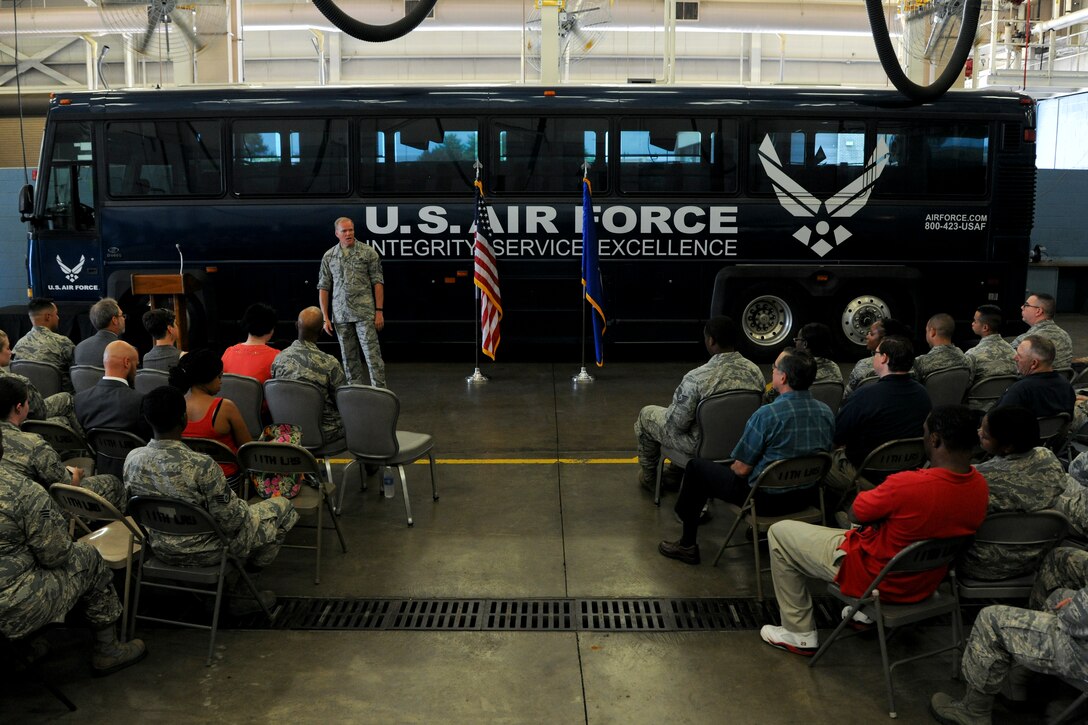 Chief Master Sgt. of the Air Force James Cody speaks during an 11th Logistics Readiness Squadron all-call, July 29, 2015, on Joint Base Andrews. Cody spoke about current events in the Air Force and answered questions from members of the 11th LRS. (U.S. Air Force photo/Airman 1st Class J.D. Maidens)