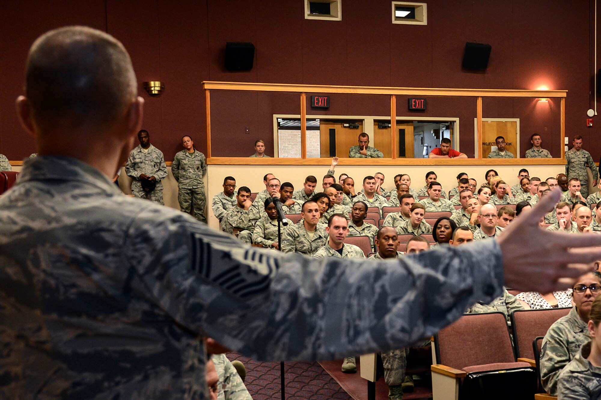 Hanscom Command Chief Master Sgt. Craig A. Poling fields questions from personnel that supervise military during an Enlisted Evaluation System and Weighted Airman Promotion System briefing at the base theater July 24. Personnel from Headquarters Air Force and the Air Force Personnel Center shared information about EES and WAPS during four briefings at Hanscom. (U.S. Air Force photo by Walter Santos)

