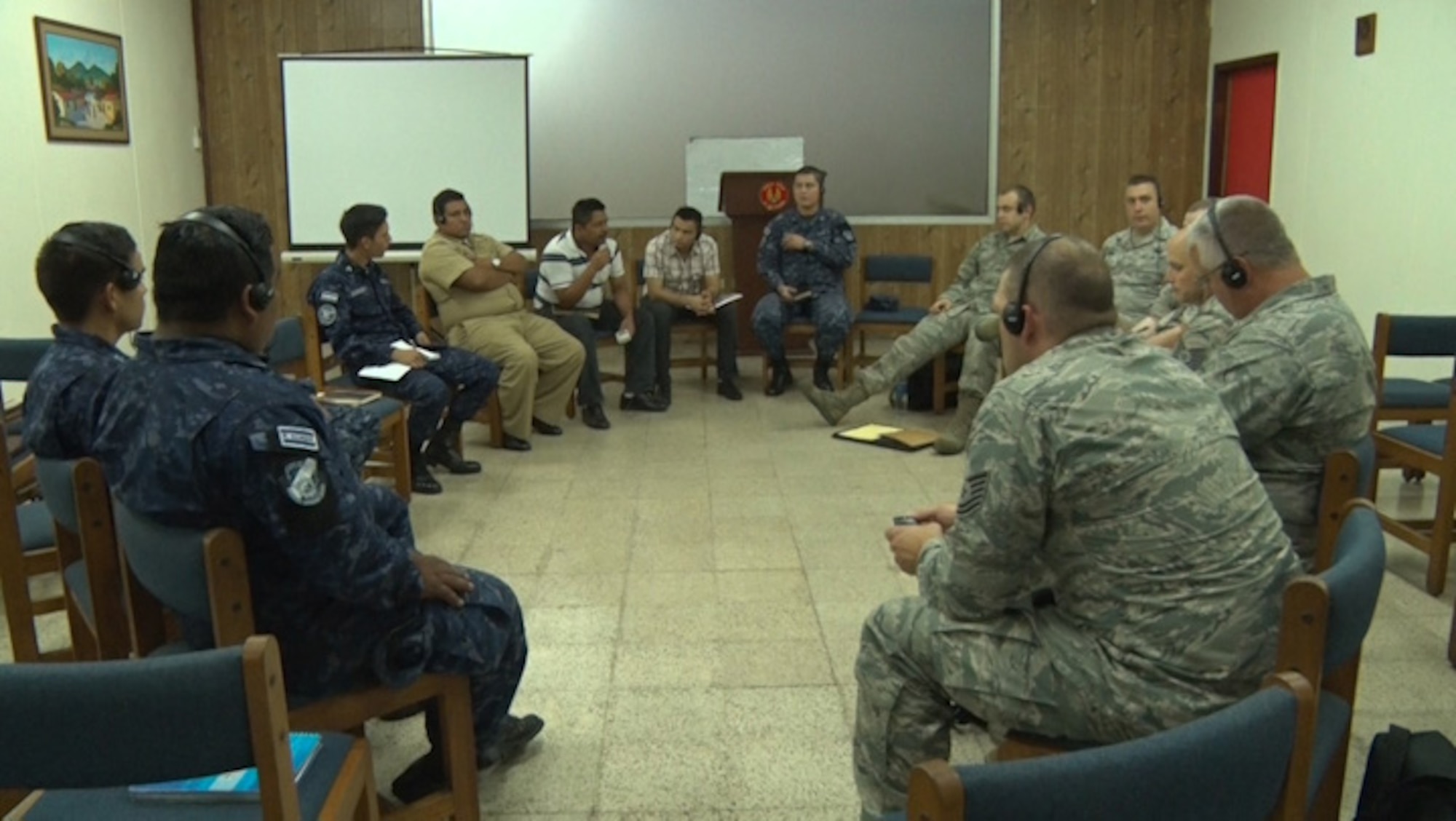 U.S. Air Force airmen (right) meet with Salvadoran Navy and Salvadoran Air Force members from Joint Headquarters El Salvador to talk about the intricacies of the Salvadoran military network, July 23, 2015, San Salvador.  Airmen from the 157th Communications Flight spent a week in El Salvador, July 21 through 24, discussing cybersecurity as part of the on-going New Hampshire state partnership program with El Salvador.  (N.H. Air National Guard photo by Tech. Sgt. Erica Rowe)