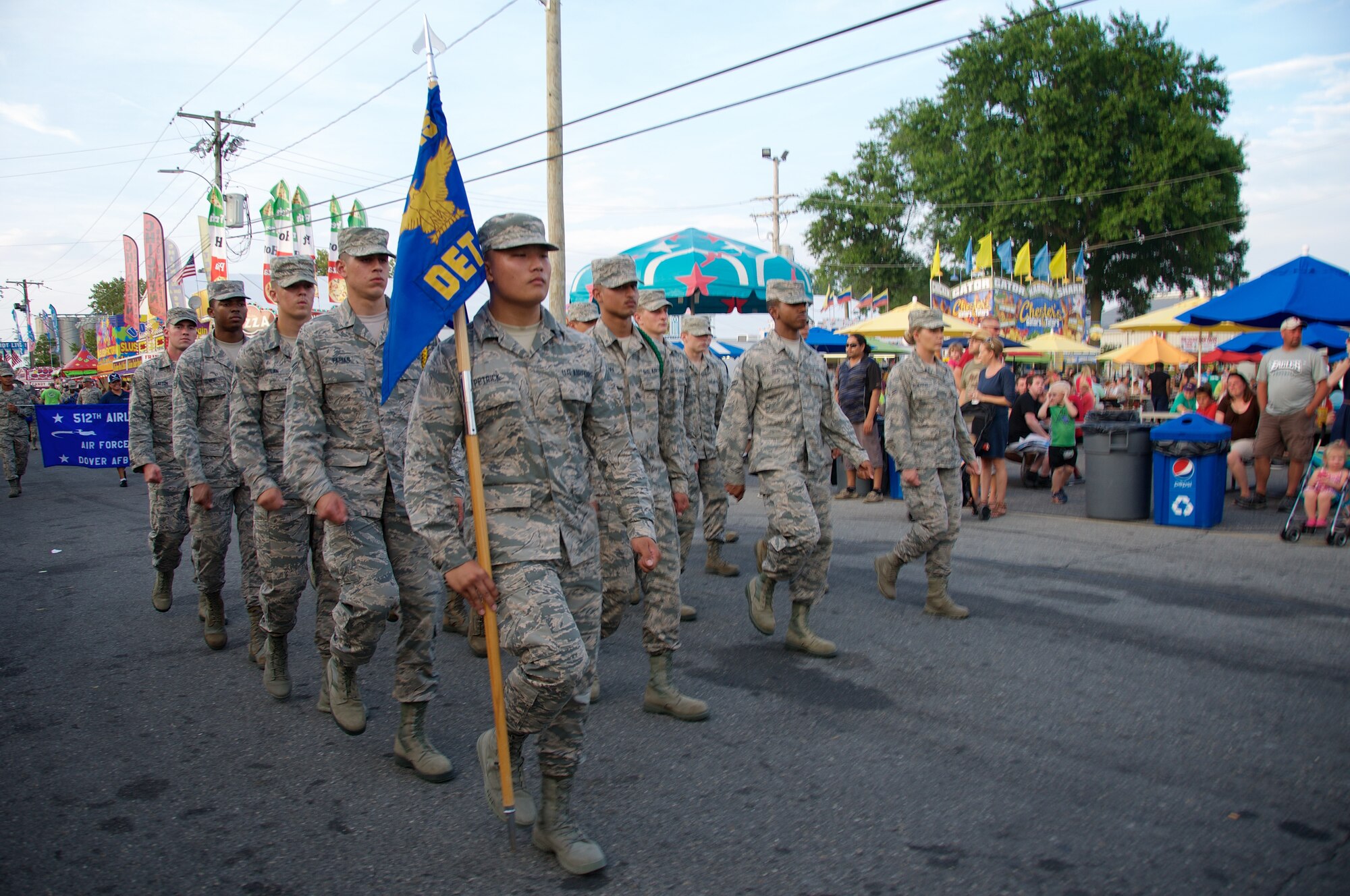 Reserve Airman from the 512th Airlift Wing join Team Dover for an Armed Forces Day parade at the Delaware State Fair, Harrington, Del., on Jul. 30, 2015. As part of Armed Forces Day, the fair recognizes veterans, service members and their families while offering free admission. (U.S. Air Force photo/2nd Lt Steve Lewis)