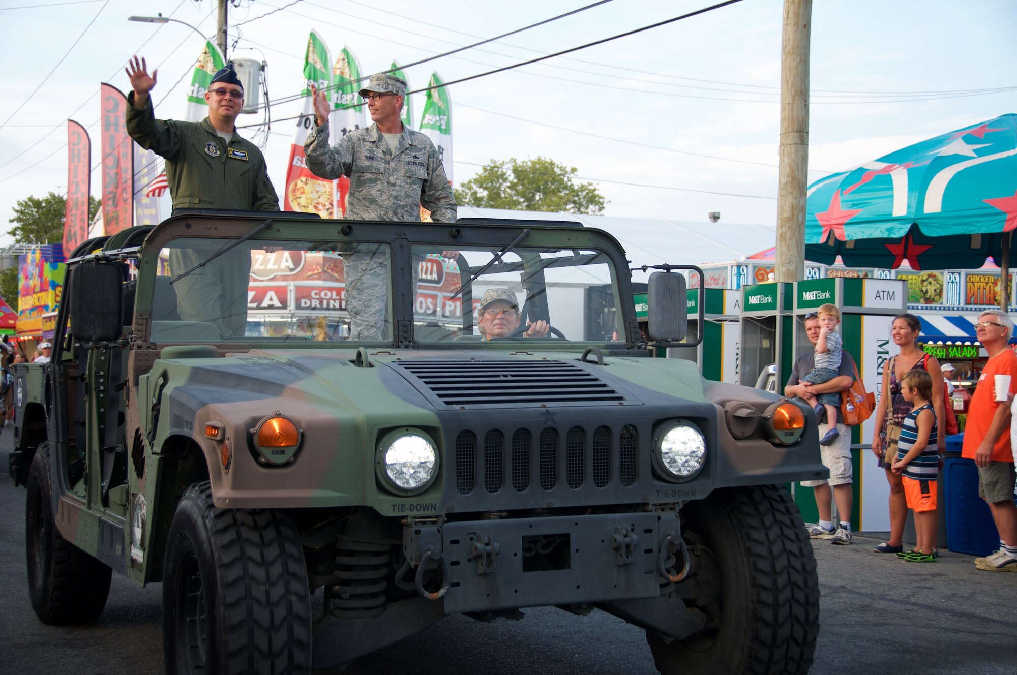 Reserve Airman from the 512th Airlift Wing join Team Dover for an Armed Forces Day parade at the Delaware State Fair, Harrington, Del., on Jul. 30, 2015. As part of Armed Forces Day, the fair recognizes veterans, service members and their families while offering free admission. (U.S. Air Force photo/2nd Lt Steve Lewis)