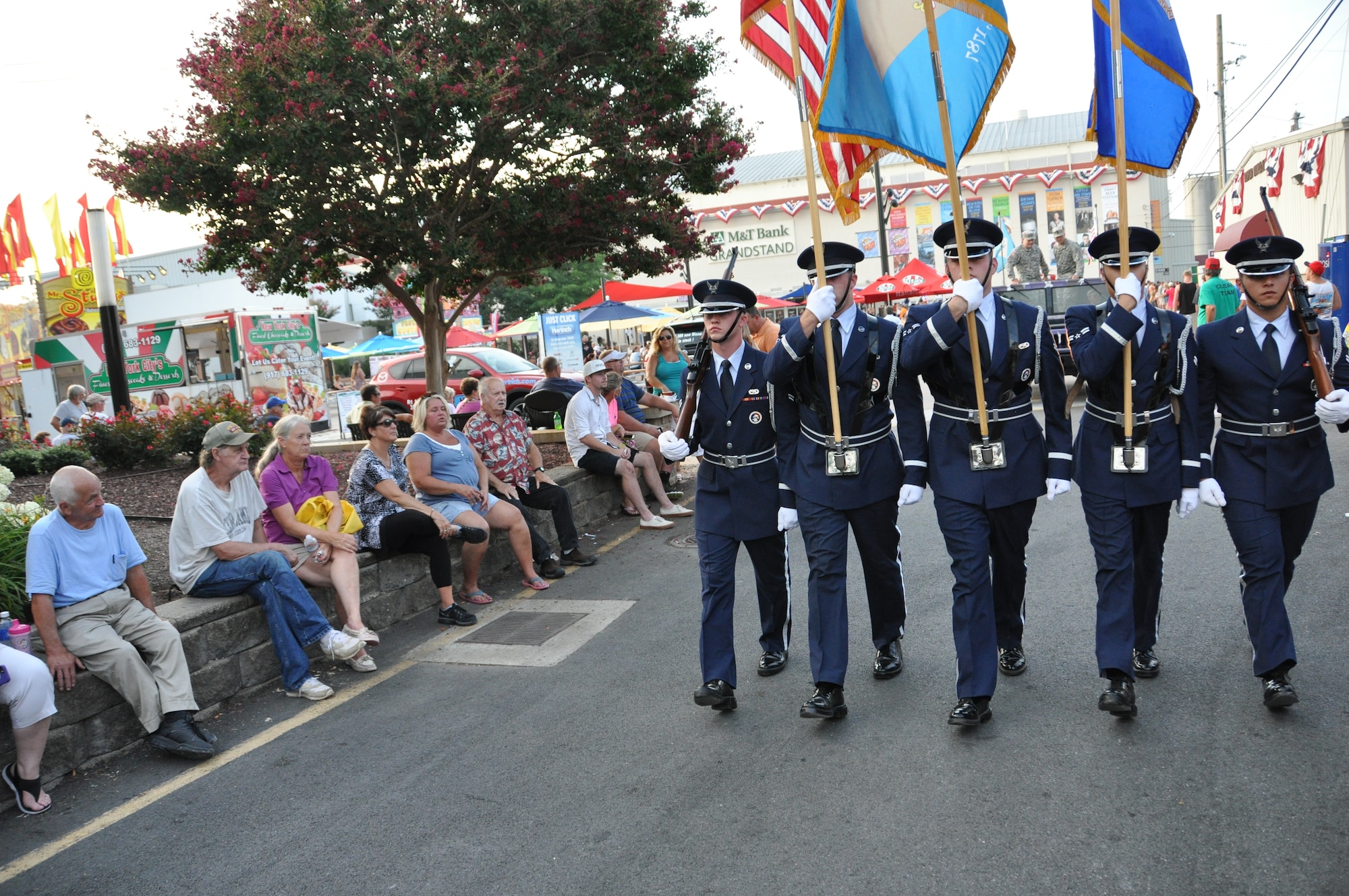 Reserve Airman from the 512th Airlift Wing join Team Dover for an Armed Forces Day parade at the Delaware State Fair, Harrington, Del., on Jul. 30, 2015. As part of Armed Forces Day, the fair recognizes veterans, service members and their families while offering free admission. (U.S. Air Force photo/Staff Sgt Joseph Yanik)