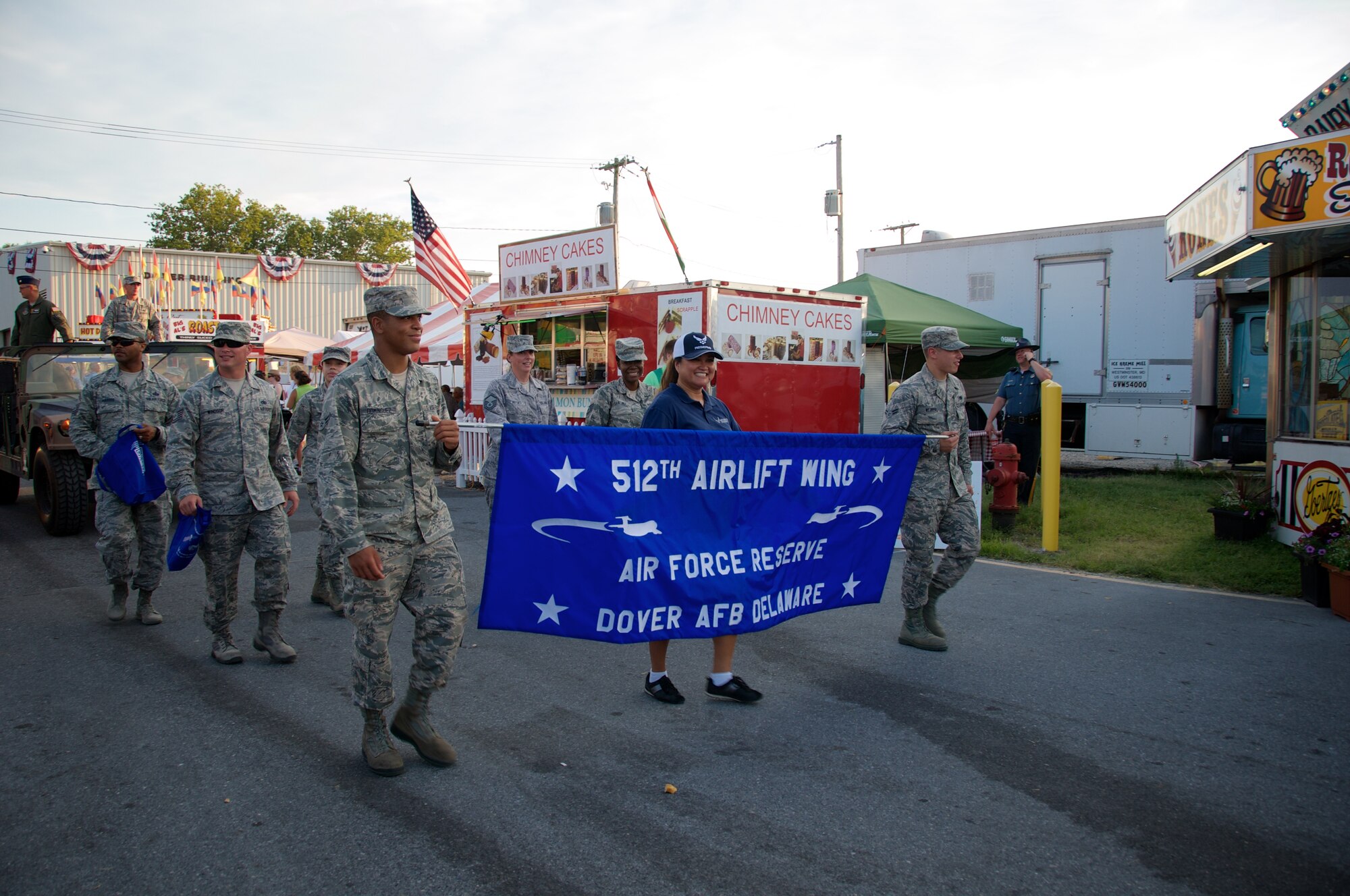 Reserve Airman from the 512th Airlift Wing join Team Dover for an Armed Forces Day parade at the Delaware State Fair, Harrington, Del., on Jul. 30, 2015. As part of Armed Forces Day, the fair recognizes veterans, service members and their families while offering free admission. (U.S. Air Force photo/2nd Lt Steve Lewis)