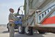 Master Sgt. George Peoples, 117th Air Refueling Wing unstraps cargo containers after arriving in Gulfport, Mississippi during a training exercise June 22 2015. (U.S. Air National Guard Photo By: Senior Master Sgt. Ken Johnson/Released)