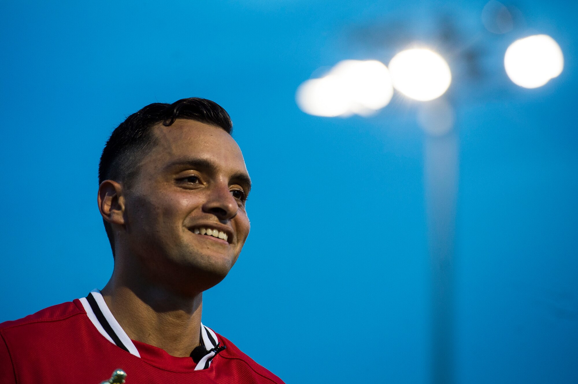 U.S. Air Force Staff Sgt. Andres Martinez, 633rd Medical Group team captain, gives a post-game interview at Langley Air Force Base, Va., July 28, 2015. Martinez and his teammates played against the 633rd Civil Engineer Squadron during the Intramural Soccer Championship game. (U.S. Air Force photo by Senior Airman Kayla Newman/Released)