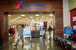 U.S. Service members and shoppers exit the Base Exchange at Langley Air Force Base, Va., July 28, 2015. Since March 2014, the Exchange has undergone numerous constructional upgrades, such as an expanded floor plan, raised ceilings and more food and shopping options. (U.S. Air Force photo by Senior Airman Jordan Garner)