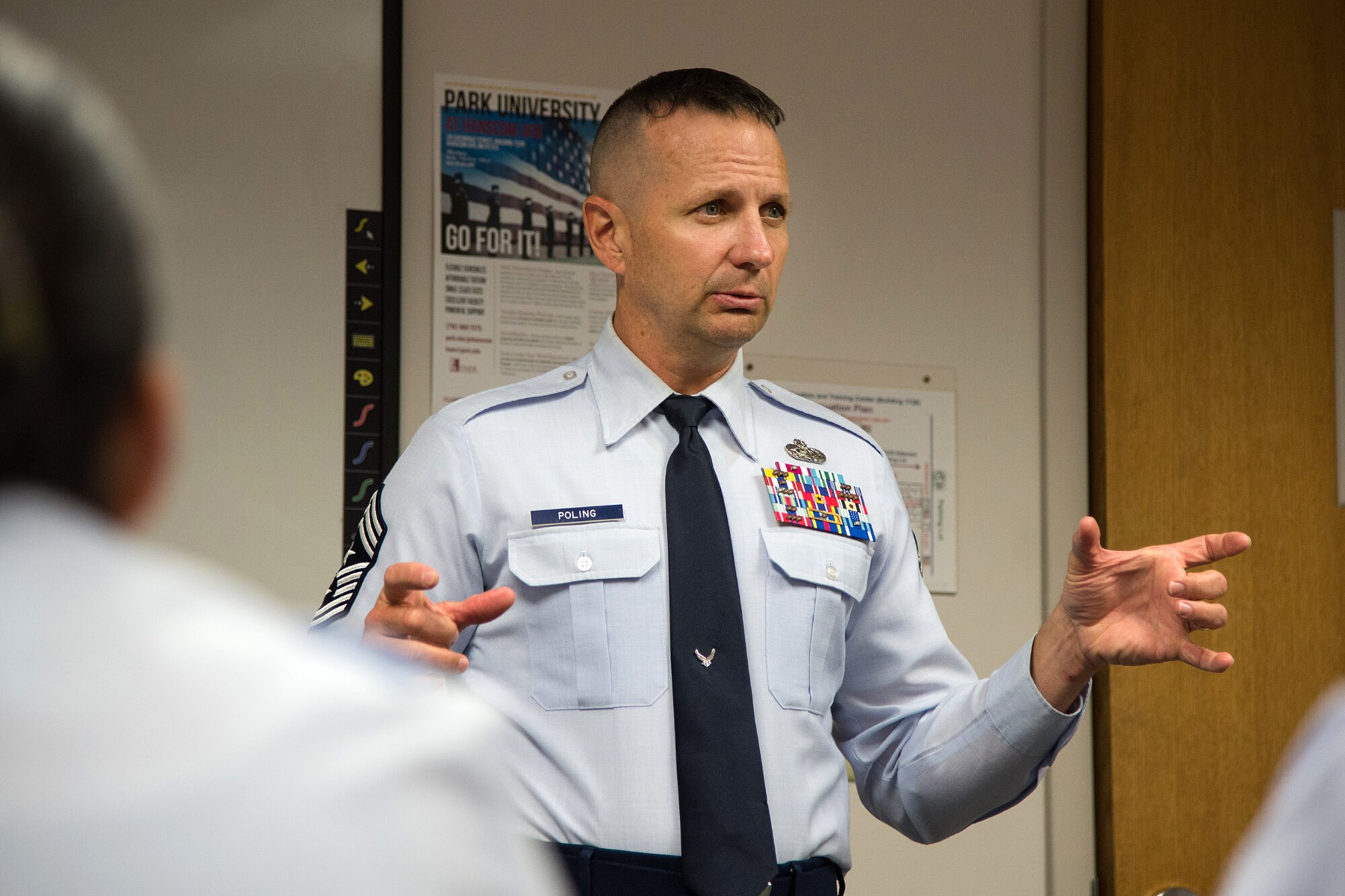 Hanscom Command Chief Master Sgt. Craig A. Poling speaks with first term Airmen at the Education and Training Center July 27 during a First Term Airman Center course. The purpose of the FTAC course is to assist Airmen transition from the training mindset to a mission-oriented environment. (U.S. Air Force photo by Mark Herlihy)