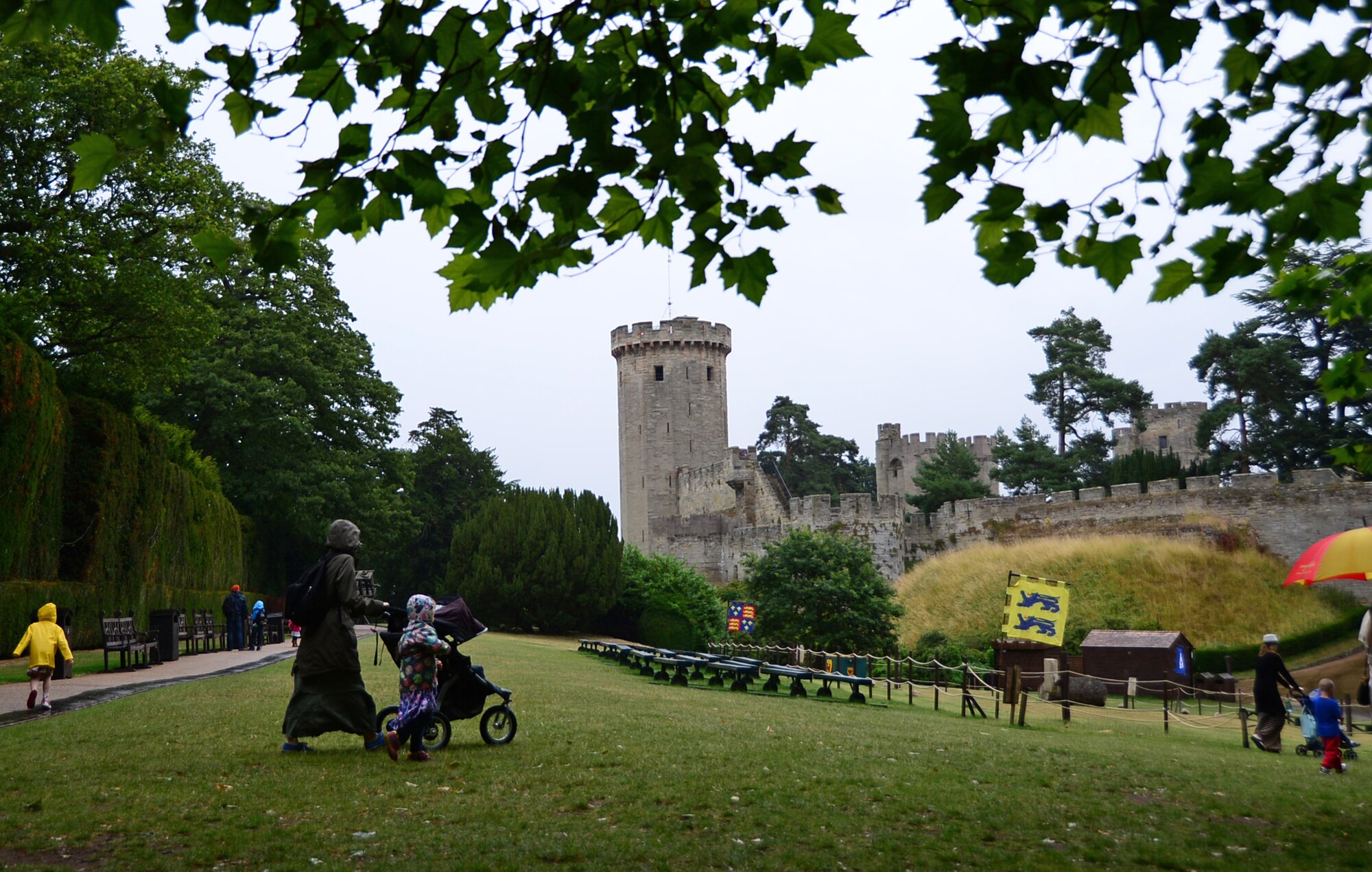 Star Copeland, wife of Tech Sgt. Jason Copeland, 48th Logistics Readiness Squadron quality assurance evaluator, sits with her son, Kincaid, on a bus to Warwick Castle, England, July 24, 2015. The Comprehensive Airman Fitness program and the 48th Fighter Wing Chaplain Corps hosted a deployed spouses trip that provided spouses with the opportunity to engage with other families and explore the local community. (U.S. Air Force photo by Senior Airman Erin O’Shea/Released) 