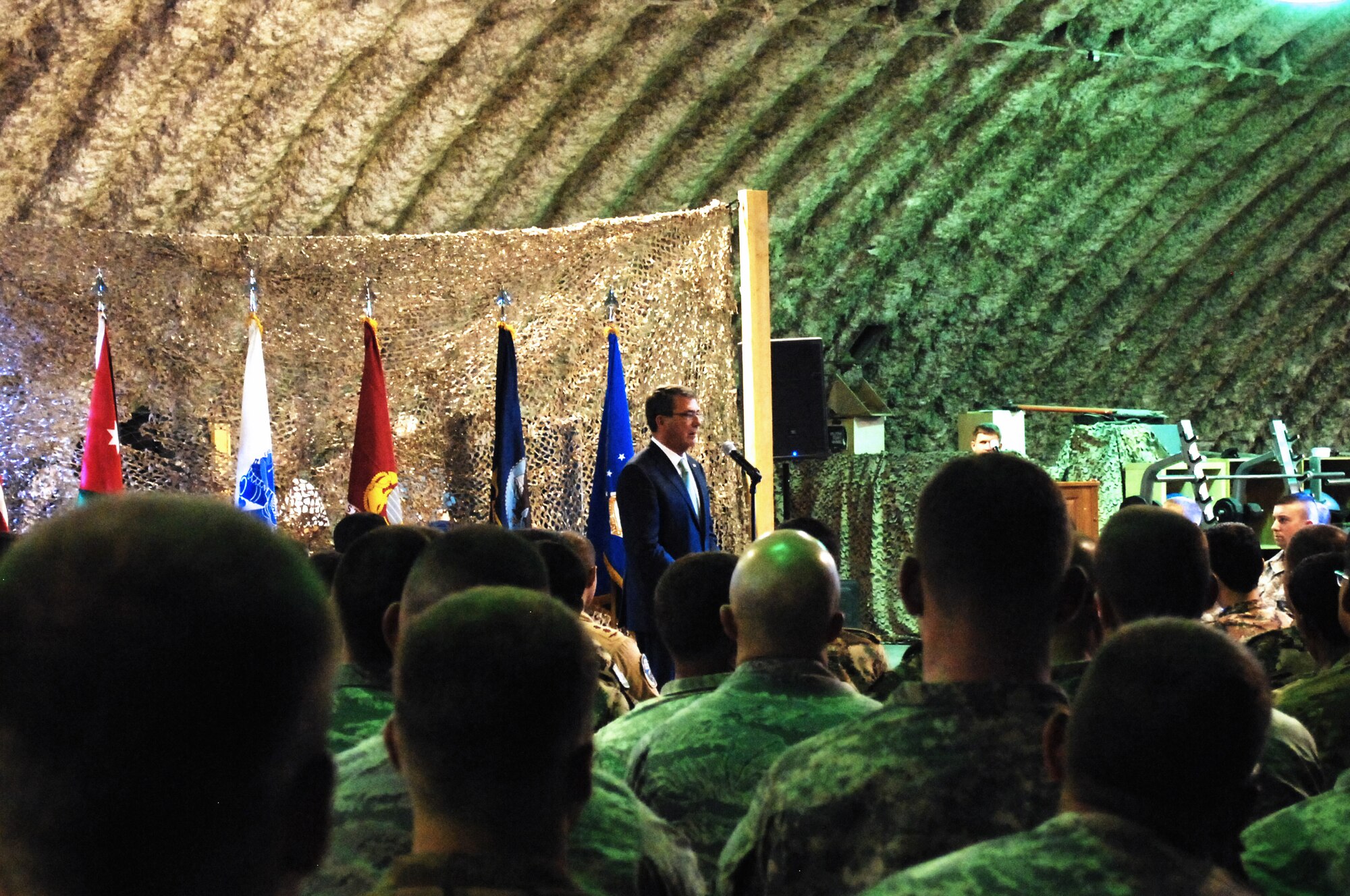 Secretary of Defense Ash Carter speaks to Airmen and Coalition partners during a multination troop event at an undisclosed location, July 21, 2015. The secretary completed a visit of countries to meet with country leaders and made a stop to meet Airmen, community leaders and Coalition partners. (U.S. Air Force photo/Capt. Ashley Walker)