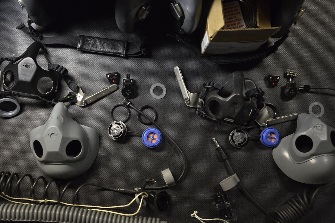 A disassembled aircrew mask waits to be inspected then re-assembled by 379th Expeditionary Operations Support Squadron Aircrew Flight Equipment airmen to proper working order for a B-1 Bomber aircrew member July 29, 2015 at Al Udeid Air Base, Qatar. B-1 Bomber aircrews rely on AFE airmen’s proficiency to ensure proper function of helmets, life preservers, communication modules and other types of equipment used during flight or in case of an emergency. (U.S. Air Force photo/Staff Sgt. Alexandre Montes)