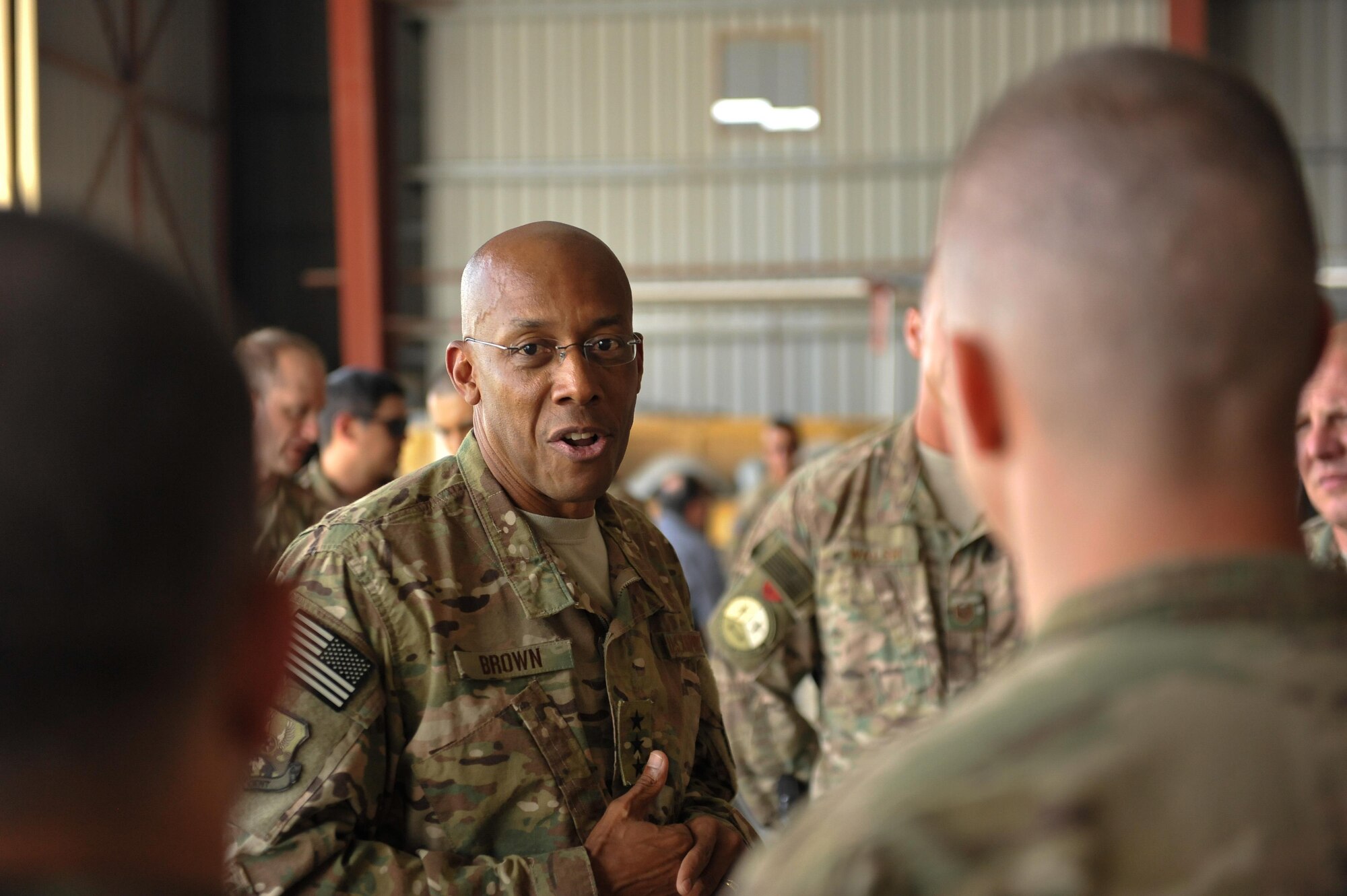 U.S. Air Force Lt. Gen. Charles Q. Brown Jr., U.S. Air Forces Central Command commander, talks with Airmen assigned to the 738th Air Expeditionary Air Advisor Group at Kandahar Airfield, Afghanistan, July 25, 2015. Brown met with Airmen from Bagram Airfield and KAF during his tour of Afghanistan and got a first-hand look at how Airmen support the mission in Afghanistan. (U.S. Air Force photo by Maj. Tony Wickman/Released)