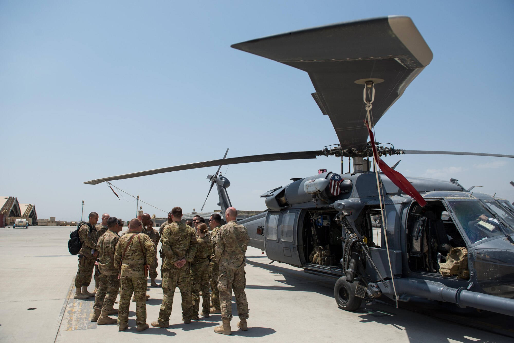 U.S. Air Force Lt. Gen. Charles Q. Brown Jr., U.S. Air Forces Central Command commander, talks with Airmen assigned to the 455th Air Expeditionary Wing at Bagram Airfield, Afghanistan, July 25, 2015. Brown met with Airmen from BAF and Kandahar Airfield during his tour of Afghanistan and got a first-hand look at how Airmen support the mission in Afghanistan. (U.S. Air Force photo by Tech. Sgt. Joseph Swafford/Released)