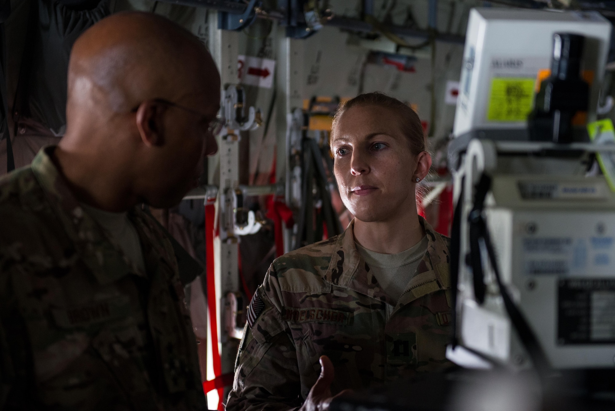 U.S. Air Force Capt. Deann Hoelscher, 455th Expeditionary Aeromedical Evacuation Squadron, explains the AE mission to Lt. Gen. Charles Q. Brown Jr., U.S. Air Forces Central Command commander, at Bagram Airfield, Afghanistan, July 25, 2015. Brown met with Airmen from BAF and Kandahar Airfield during his tour of Afghanistan and got a first-hand look at how Airmen support the mission in Afghanistan. (U.S. Air Force photo by Tech. Sgt. Joseph Swafford/Released)