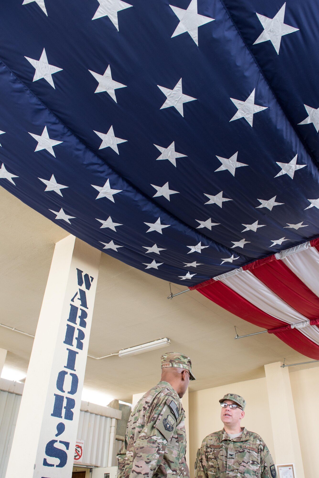U.S. Air Force Col. Gianna Zeh, 455th Expeditionary Medical Group commander, explains the EMDG mission to Lt. Gen. Charles Q. Brown Jr., U.S. Air Forces Central Command commander, at Bagram Airfield, Afghanistan, July 25, 2015. Brown met with Airmen from BAF and Kandahar Airfield during his tour of Afghanistan and got a first-hand look at how Airmen support the mission in Afghanistan. (U.S. Air Force photo by Tech. Sgt. Joseph Swafford/Released)