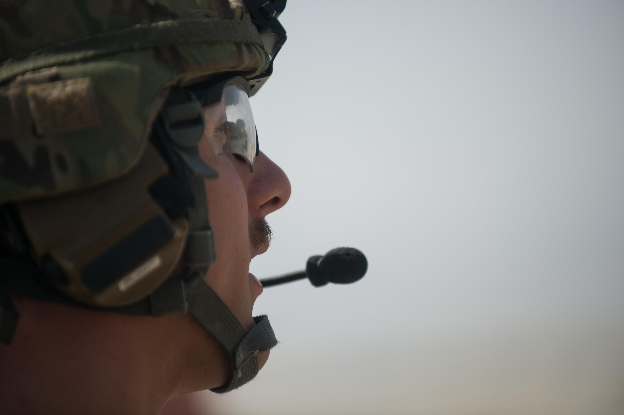 A U.S. Airman assigned to the 455th Expeditionary Security Forces Squadron explains his job to Lt. Gen. Charles Q. Brown Jr., U.S. Air Forces Central Command commander, at Bagram Airfield, Afghanistan, July 25, 2015. Brown met with Airmen from BAF and Kandahar Airfield during his tour of Afghanistan and got a first-hand look at how Airmen support the mission in Afghanistan. (U.S. Air Force photo by Tech. Sgt. Joseph Swafford/Released)