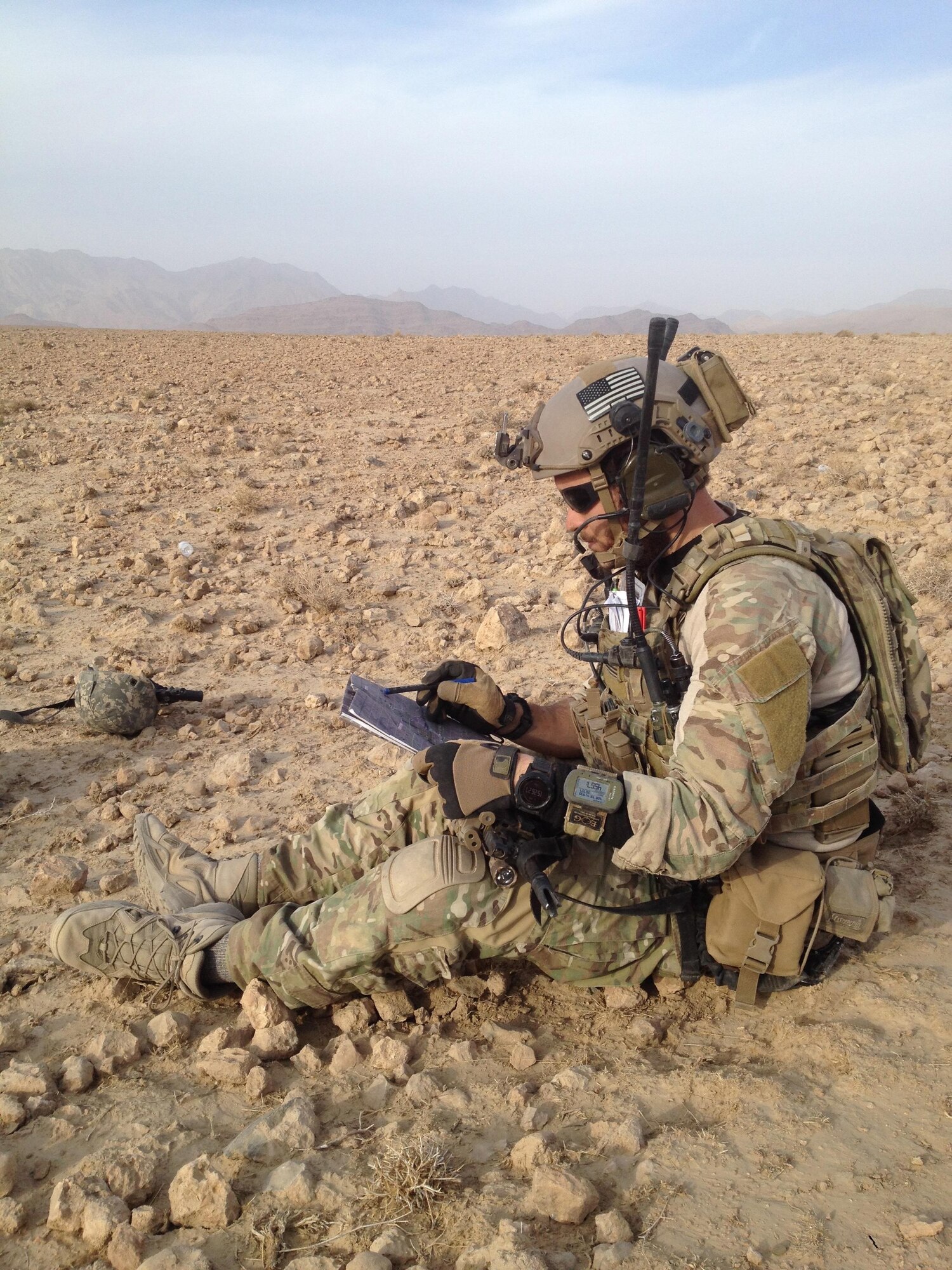 Staff Sgt. Travis Jordan, 320th Special Tactics Squadron combat controller, relays friendly positions to aircraft during a mission in Afghanistan Dec. 19, 2014. Jordan is one of the 12 Outstanding Airmen of the Year for 2015. (Courtesy photo)