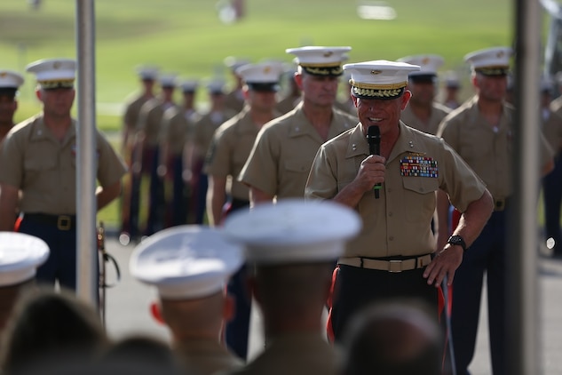 Major Gen. Lawrence D. Nicholson addresses the ceremony’s guests  after relinquishing his role as the commanding general of the 1st Marine Division to Brig. Gen. Daniel D. Yoo aboard Marine Corps Base Camp Pendleton, Calif., July 30, 2015. Yoo most recently served as the assistant division commander for 1st Marine Division.