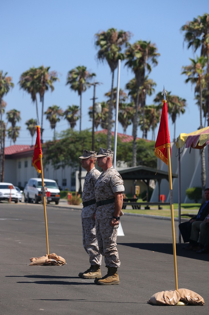 U.S. Marine Corps Colonels Matthew G. Trollinger, left, and Clay C. Tipton stand in the reviewing area during a change of command ceremony aboard Camp Pendleton, Calif., July 17. Trollinger relinquished his command of the 11th MEU to Tipton. (U.S. Marine Corps photo by Cpl. Jonathan R. Waldman/Released)